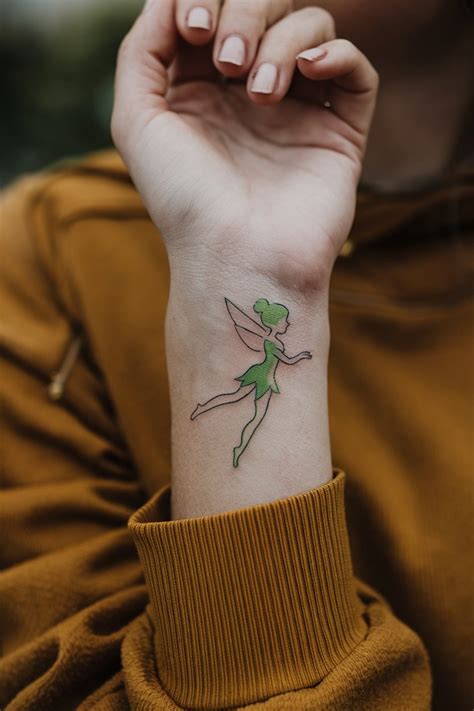 20 Tinkerbell Tattoo Ideas That Will Inspire Your Next Ink