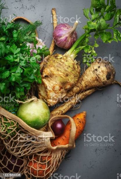 Autumn Food Background With Vegetables Root Crops In String Bag