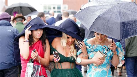 Bring A Brolly Racegoers Brave The Rain On Aintree S Ladies Day Uk News Sky News