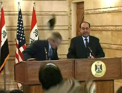 George W Bush Ducked Shoes Thrown By An Iraqi Journalist Ten Years Ago The Washington Post