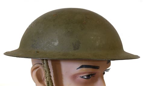 Lot 255 Two British Second World War Brodie Helmets