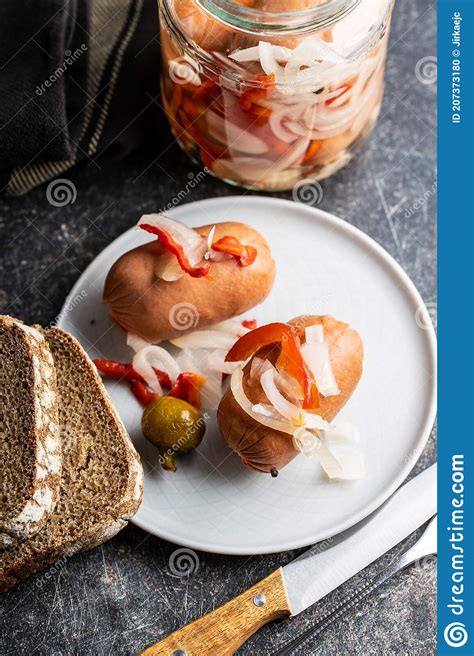 Pickled Sausages With Onion And Red Pepper Marinated Food Stock Image