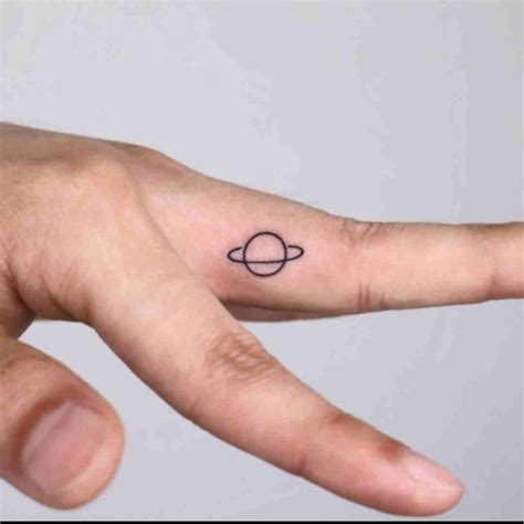 Pin By Thannarch On Tattoos Saturn Tattoo Small Hand Tattoos Hand