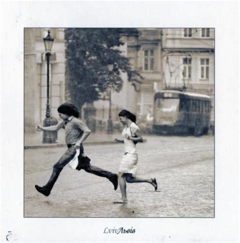 Postcard People Running From The Rain In Ukrain In 2025