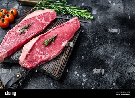 Raw Top Sirloin Cap Or Picanha Steak Black Background Top View Stock Raw Top Sirloin Cap Or Picanha Steak Black Background Top View Stock