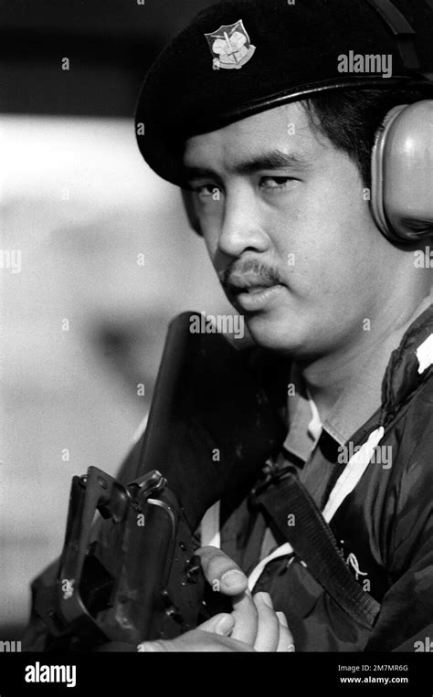 Sgt Mario S Rivera Sights Down The Barrel Of An M 16 Rifle During An
