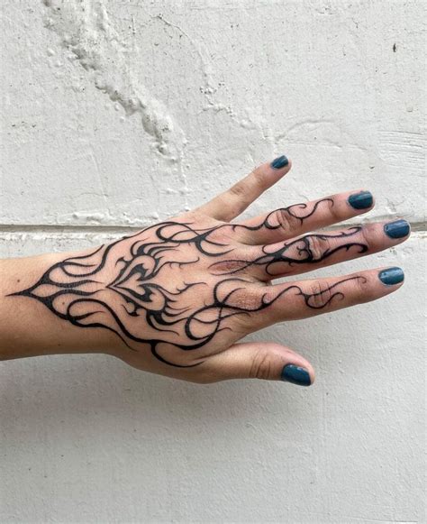 Simple Tribal Hand Tattoo