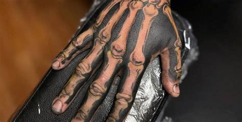 Tattoo Designs Clenched Skeleton Fist