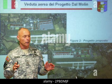 U S Army General Frank Helmick Gestures At A Press Conference On The Dal Molin Base Expansion Project Near Vicenza Northern Italy Thursday June 14 2007 At Left A Slide Of The Existing