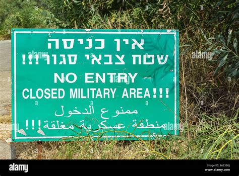 Warning Sign Indicating Restricted Military Area Written In Hebrew