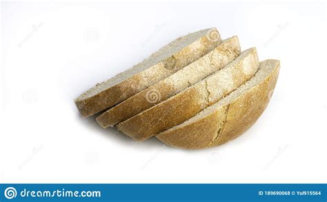 Wheat Flour Homemade Round Bread And Slices Of Bread On A White